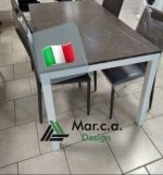 Tavolo con base in metallo e piano in nobilitato - Marca Design